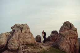 Austria wedding photographer - wedding couple portrait with rocks