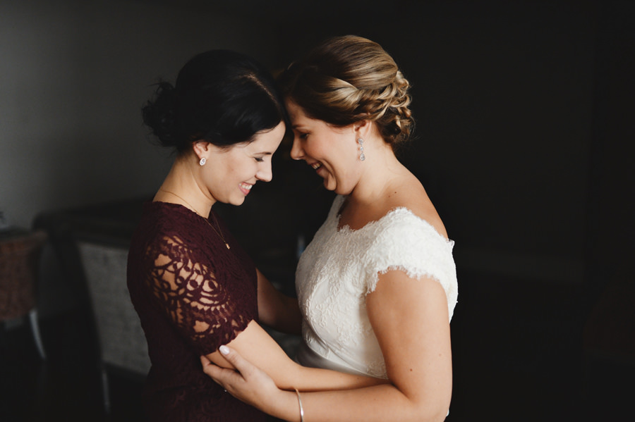 bride and friend hugging