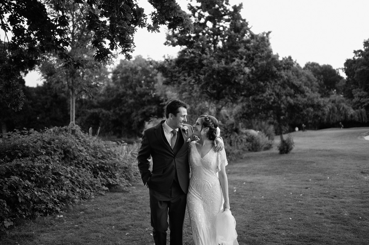 Wedding photographer London Wimbledon - wedding couple portrait at golf course