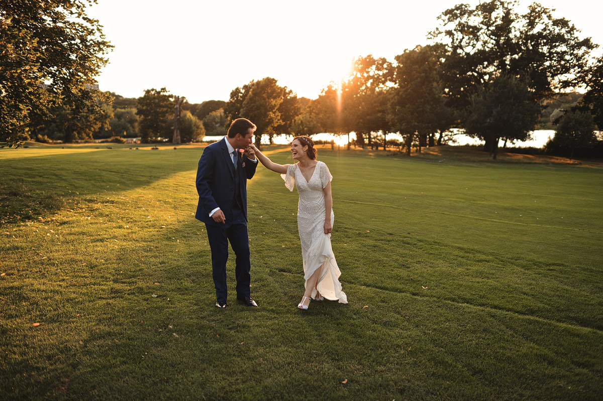 Sunset wedding couple portrait at a golf course in London
