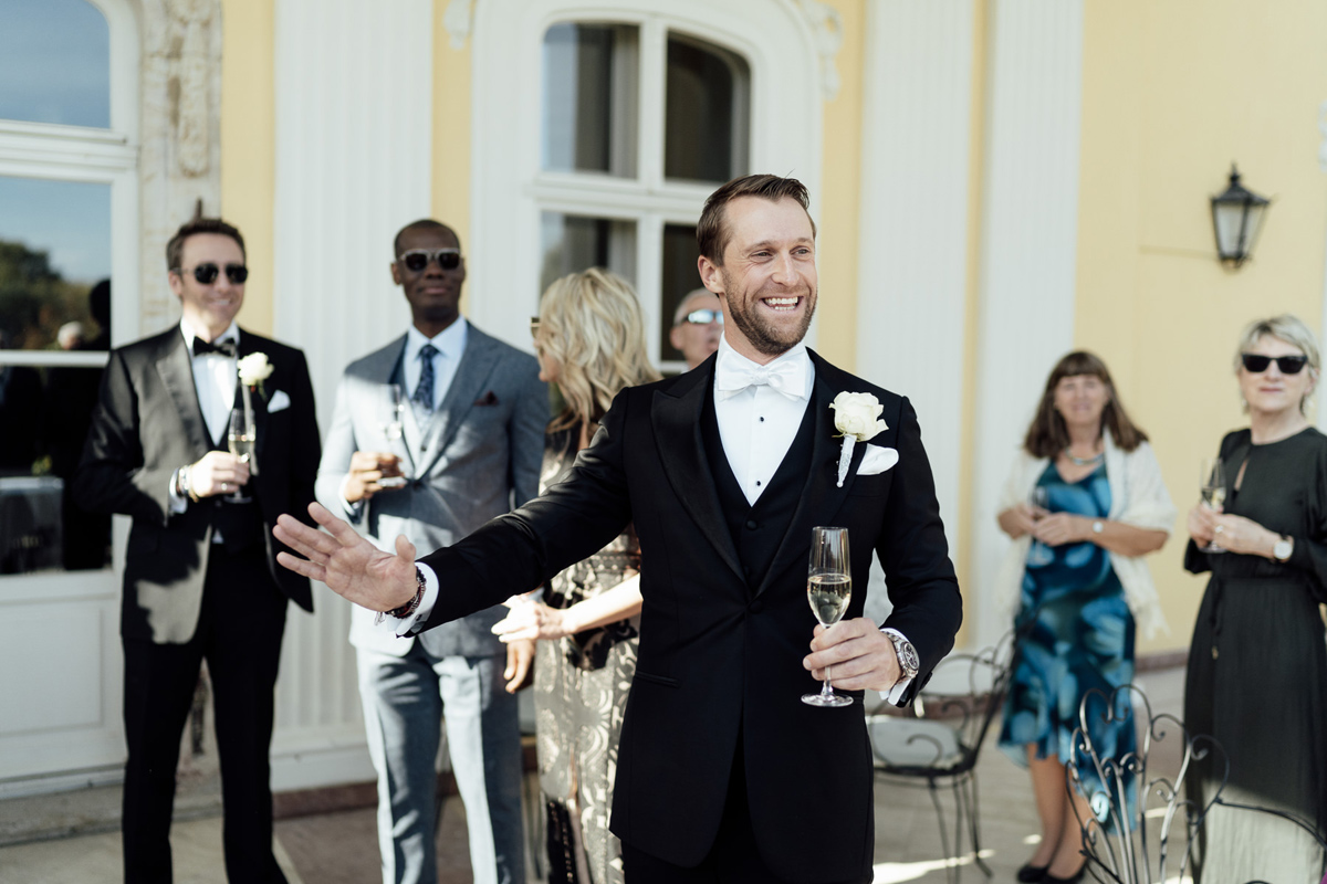 Groom welcoming Wedding guests in Hotel Chateau Bela
