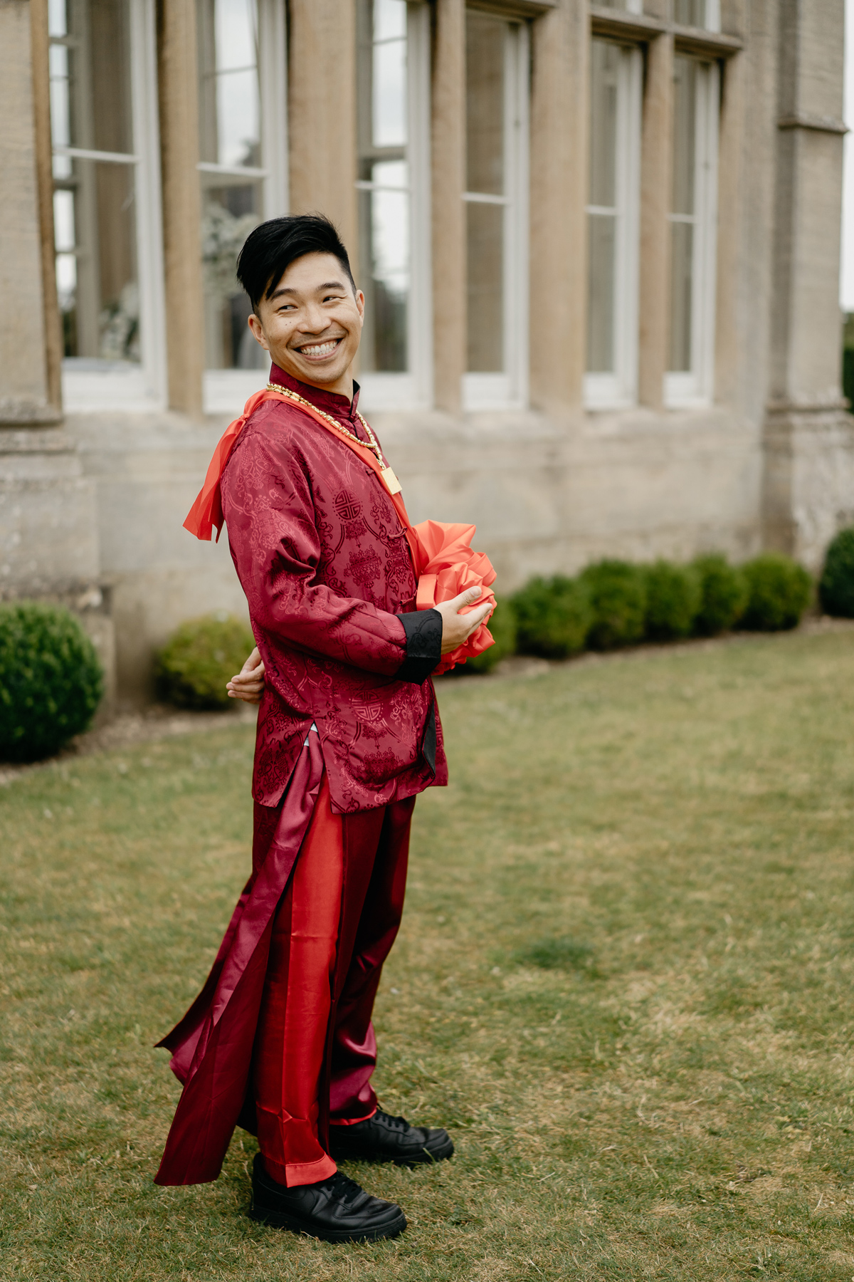 wedding portraits in traditional Chinese dresses at Stoke Rochford Hall Hotel